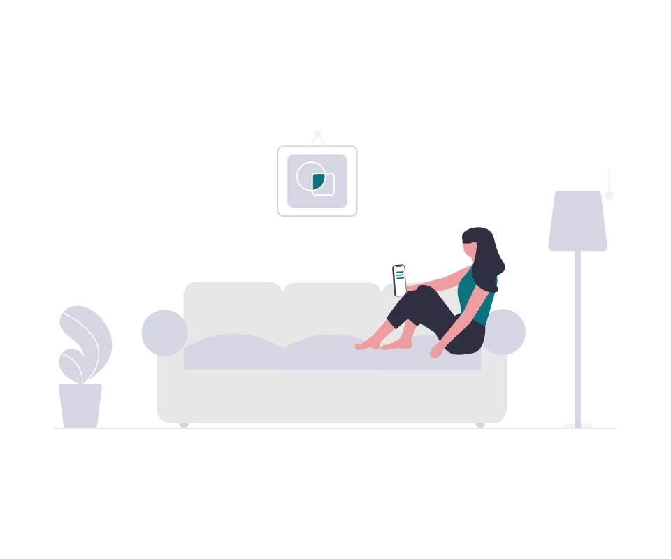Eine Person entspannt auf einem Sofa in einem gemuetlichen Zuhause.